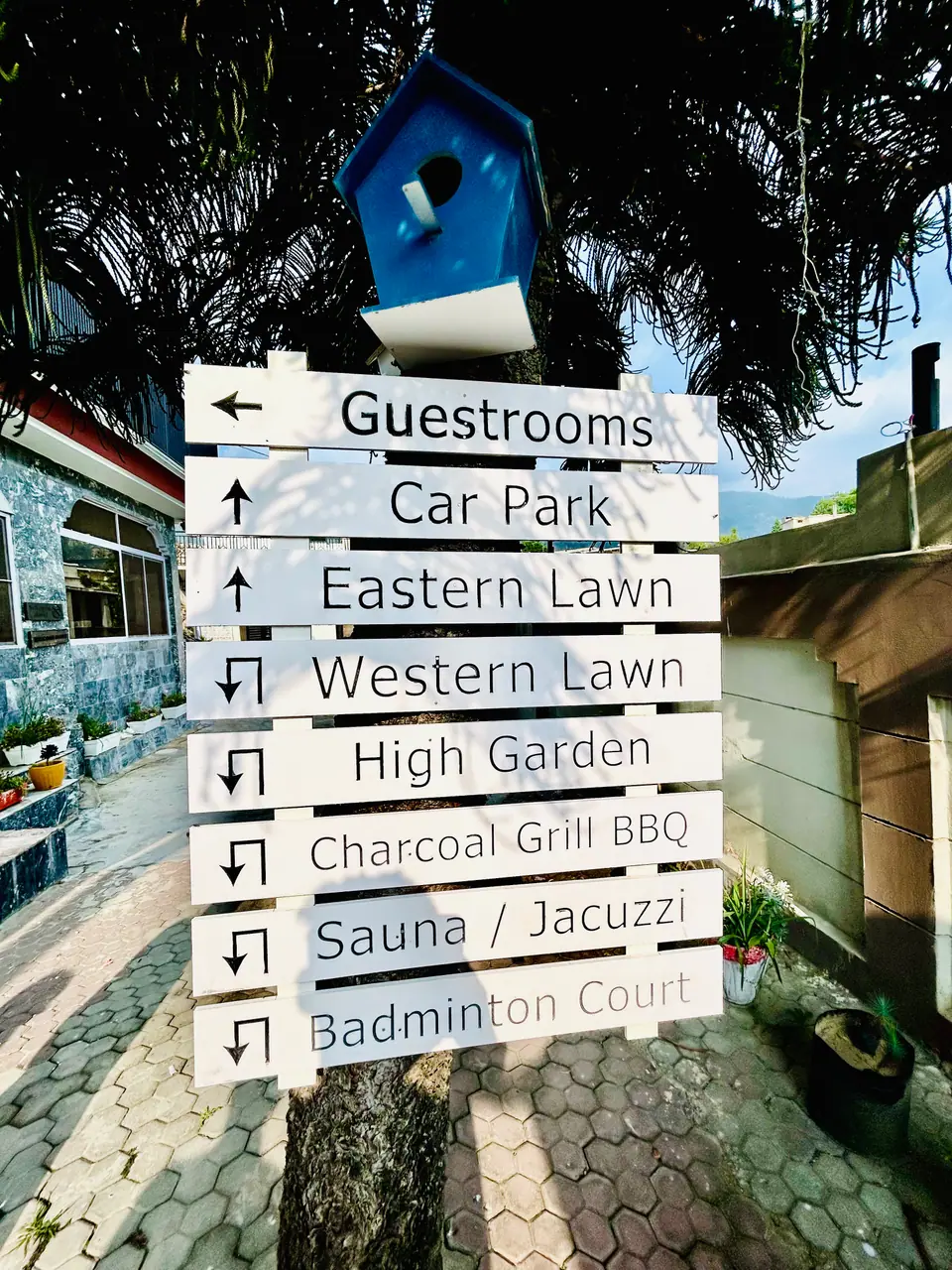 Lawns, BBQ & sauna — this way